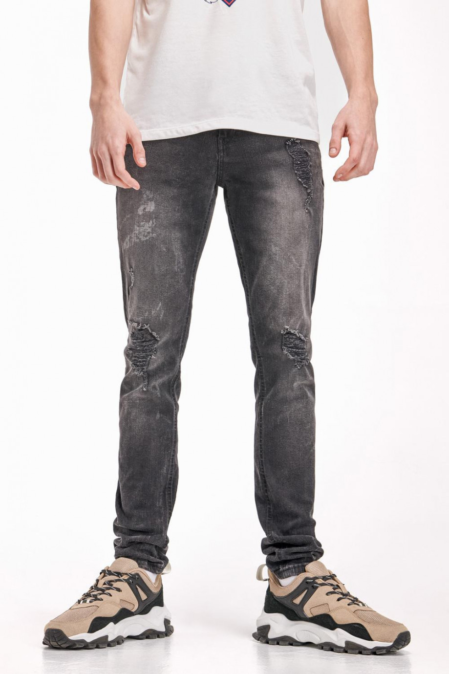 Jean gris oscuro súper skinny con rotos localizados