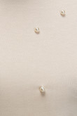 Camiseta manga larga unicolor con cuello redondo y perlas
