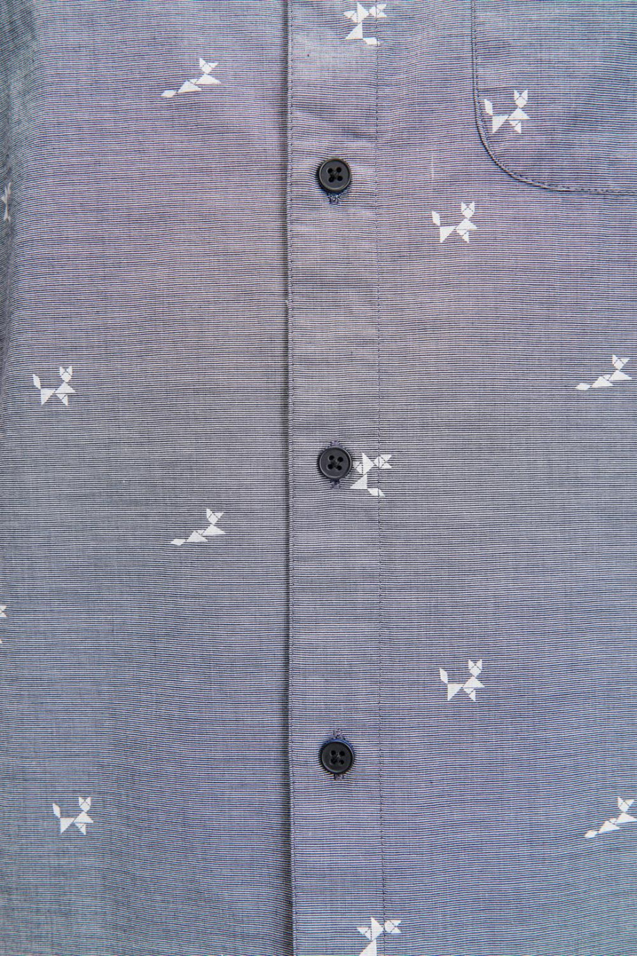 Camisa unicolor manga corta con figuras estampadas