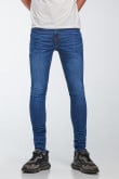 Jean súper skinny azul oscuro con desgastes de color y 5 bolsillos