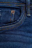 Jean skinny azul intenso con costuras blancas y amarillas
