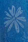 Jean jegging azul medio con diseños de flores en láser