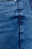 Jean súper skinny azul con tiro bajo y efectos desteñidos