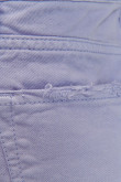 Short azul claro en jean con rotos delanteros y tiro alto