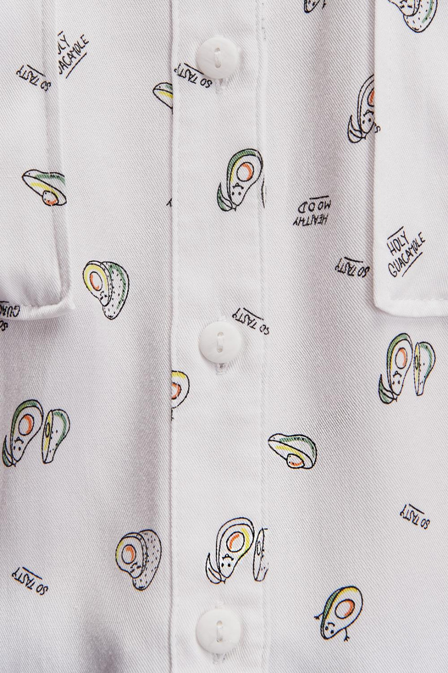 Blusa manga larga blanca con estampados de aguacates