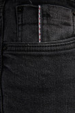 Jean gris oscuro skinny con botón en la cintura y tiro bajo