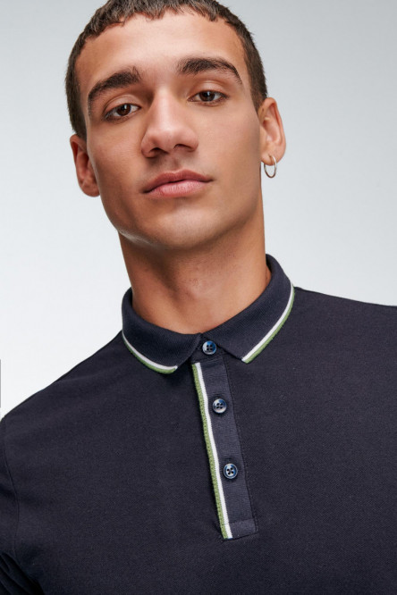 Camiseta Polo manga corta con cuello y puños en rectilineo, con pechera externa en rectilineo