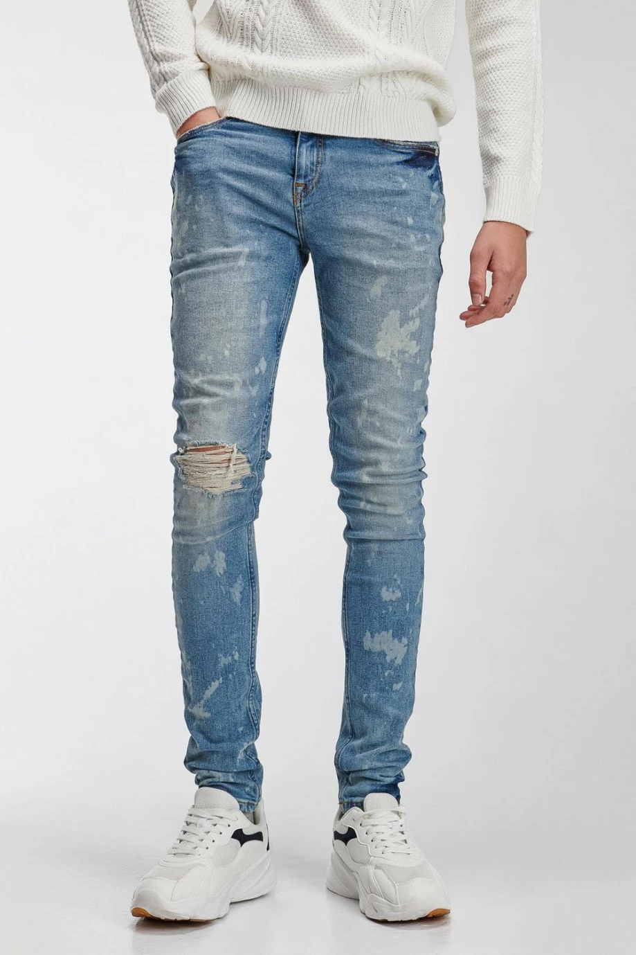 Jean súper skinny azul medio con diseños en láser y rotos