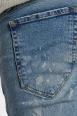 Jean súper skinny azul medio con diseños en láser y rotos en frente