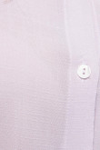 Blusa manga corta unicolor con cuello camisero y bolsillo en frente