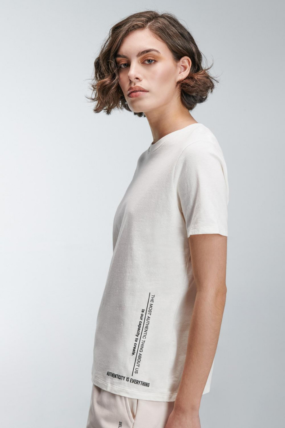 Camiseta unicolor manga corta con estampado de letras