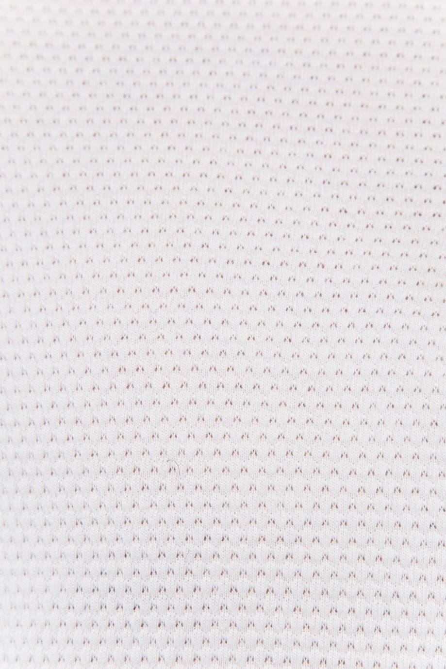 Camiseta unicolor polo en tela texturizada con botones delanteros