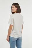 Camiseta unicolor con diseño estampado y manga corta