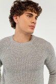 Suéter unicolor cuello redondo tejido