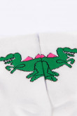 Medias cortas blancas con diseño de dinosaurios verdes