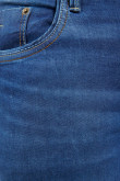 Jean azul oscuro skinny fit tiro bajo con costuras en contraste