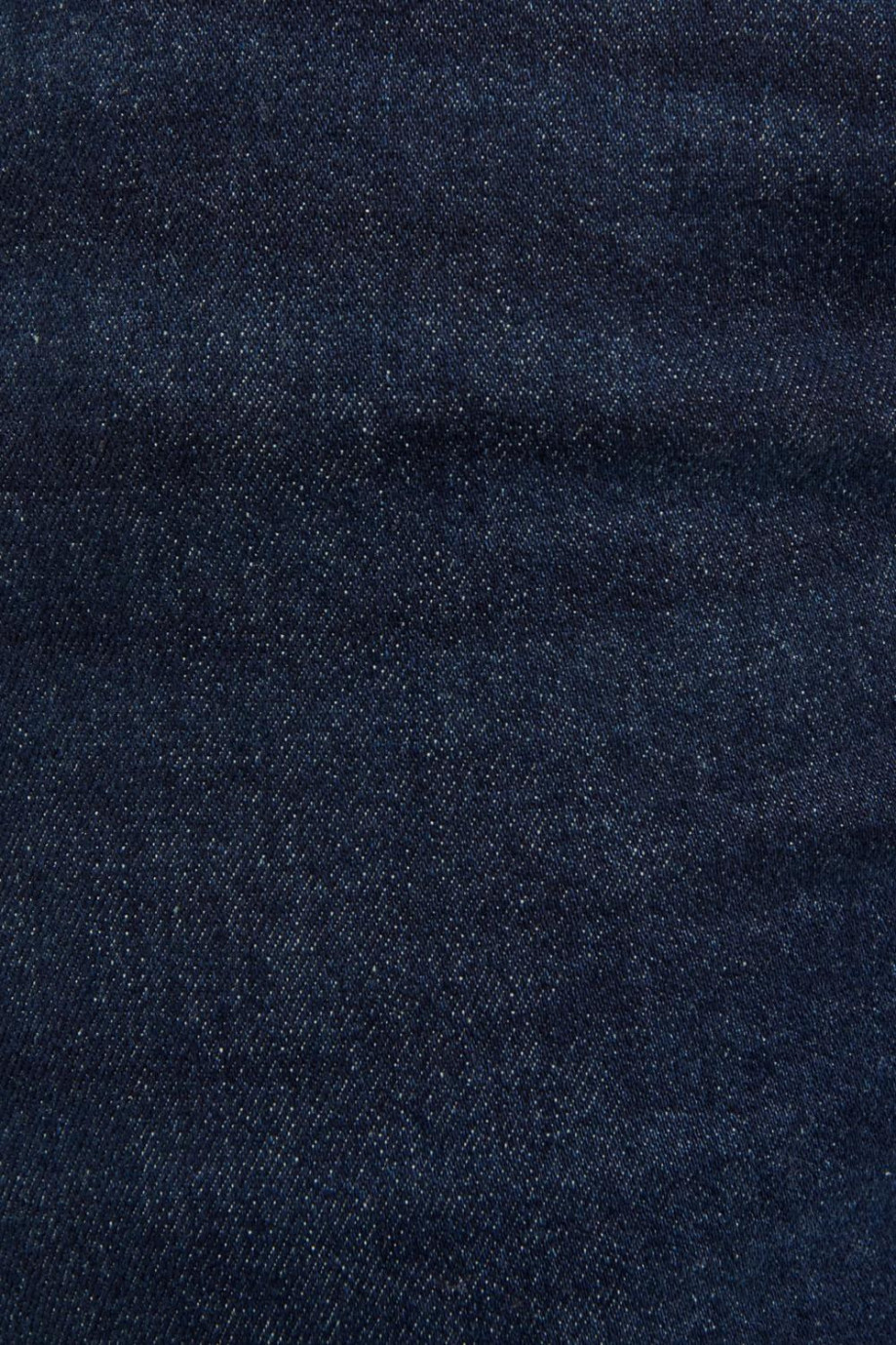 Jean skinny fit azul intenso con hilos en contraste y tiro bajo