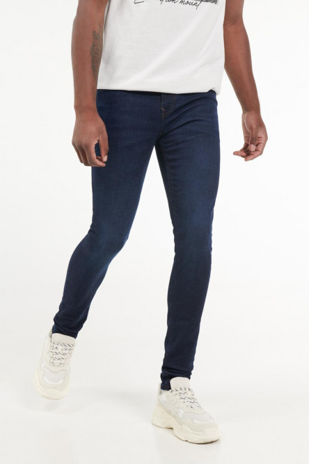Jean súper skinny azul con hilos en contraste y tiro bajo