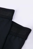 Bóxer negro tipo midway brief con costuras visibles en frente