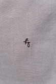 Camisa manga larga unicolor con cuello button down