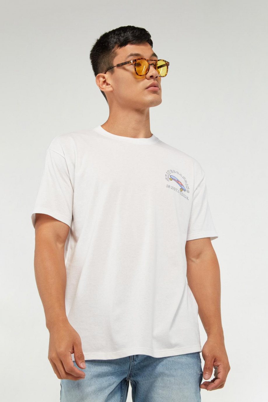 Camiseta oversize unicolor con estampados y mangas cortas