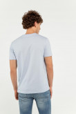 Camiseta unicolor cuello redondo con estampado delantero