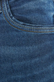 Jean skinny tiro bajo azul oscuro con costuras bicolores