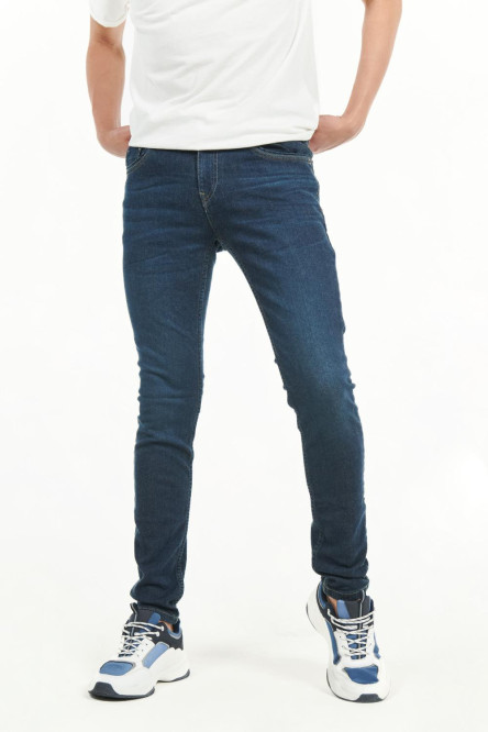 Jean azul skinny fit con tiro bajo y costuras en contraste