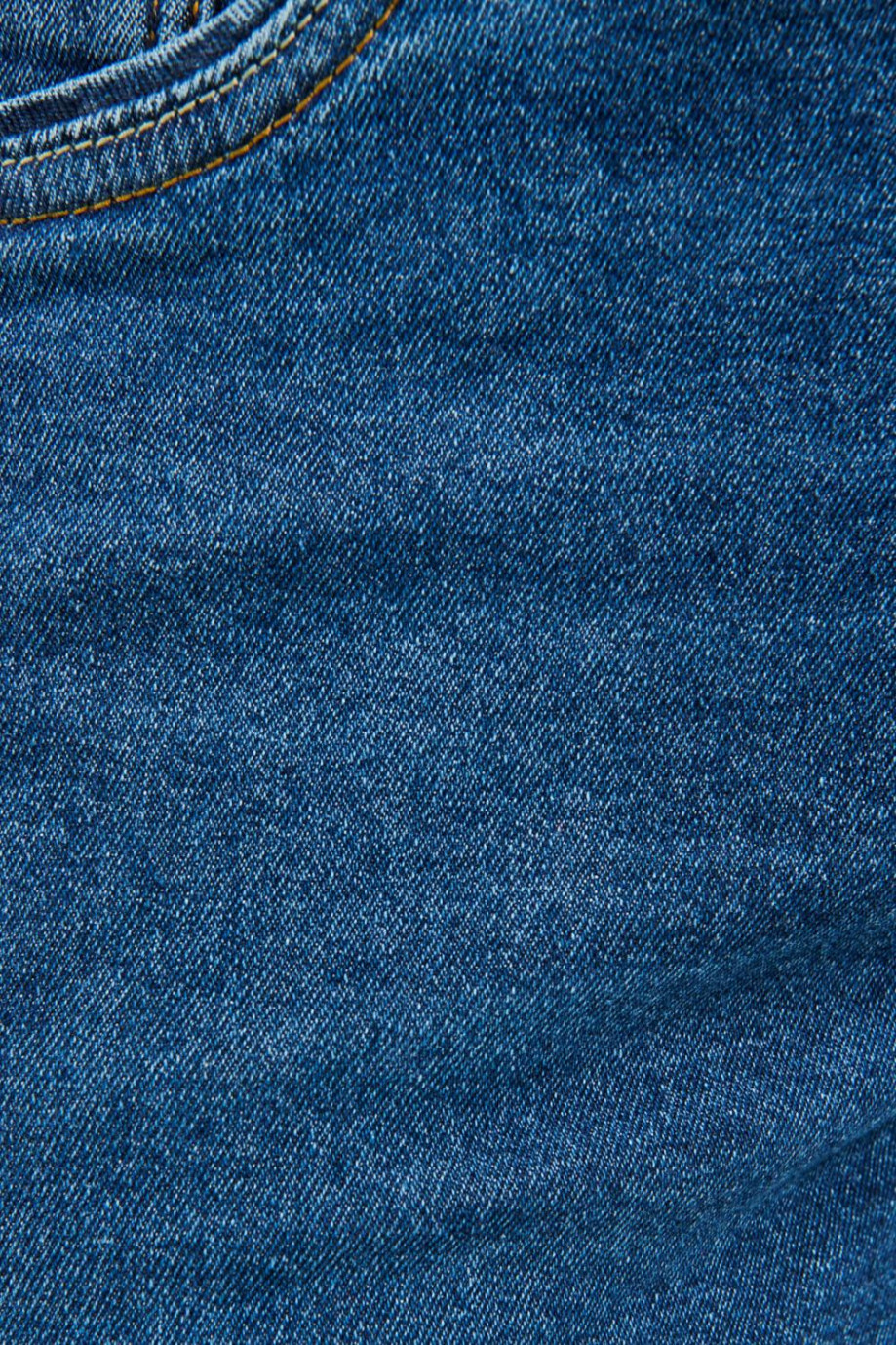Jean skinny azul oscuro tiro bajo con costuras en contraste