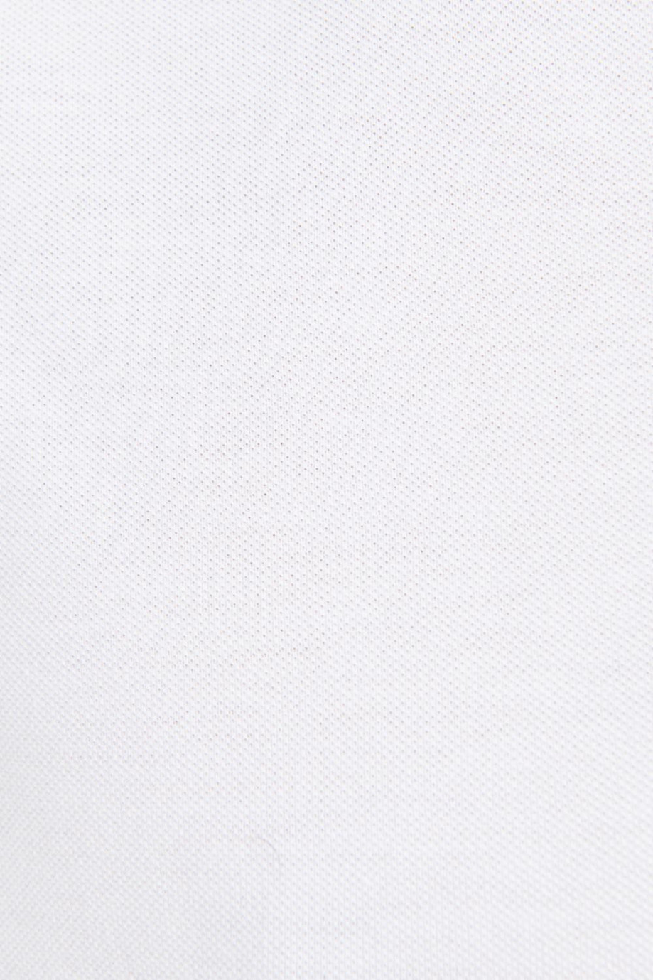 Camiseta polo unicolor con tejido de rayas en contraste