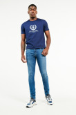 Jean skinny fit azul medio con costuras en contraste y tiro bajo