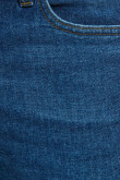 Jean slim azul oscuro con costuras en contraste y tiro bajo