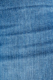 Jean azul medio tipo jegging con desgastes de color y tiro alto