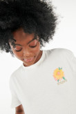 Camiseta unicolor con estampado floral y cuello redondo