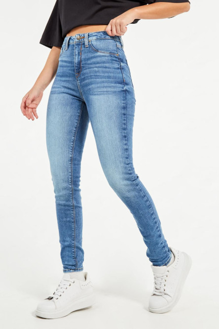 Jean jegging azul oscuro con desgastes y tiro súper alto