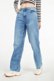 Jean ancho 90´S azul medio con tiro alto y botas amplias