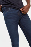Jean tiro bajo skinny azul con bolsillos y botón en pretina