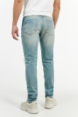 Jean azul medio skinny con rotos y estampados de manchas