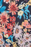 Blusa manga corta amplia unicolor con estampados florales