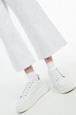 Jean culotte blanco tiro alto con botas amplias cortas