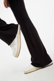 Pantalón flare negro en tela con bota campana y tiro súper alto