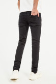 Jean negro tipo skinny con diseños de manchas y tiro bajo