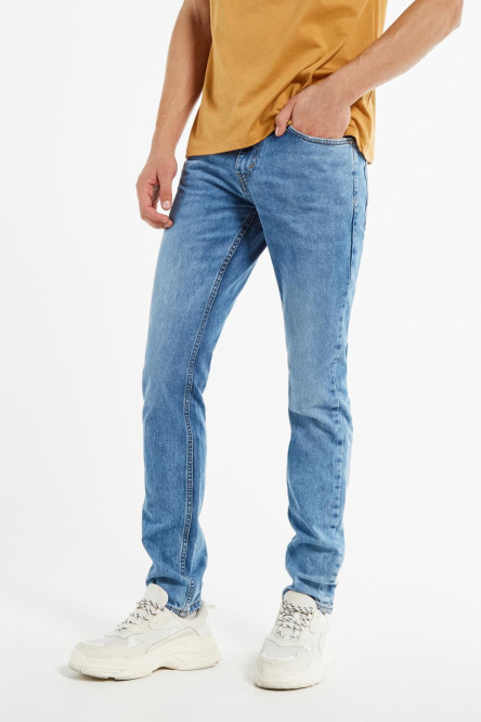 Jean 90´S tiro bajo azul medio con 5 bolsillos y botas rectas