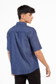 Camisa manga corta unicolor con bolsillo y cuello sport