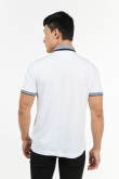 Camiseta polo manga corta unicolor con cuello y puños en contraste