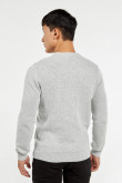 Suéter tejido unicolor con ajuste ceñido y cuello redondo