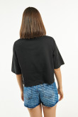 Camiseta negra crop top oversize con estampado de Hot Stuff y cuello redondo