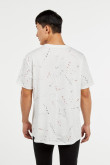 Camiseta manga corta crema oversize con diseños de manchas