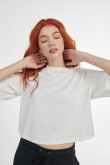 Camiseta crop top crema clara oversize con manga corta