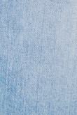 Jean skinny azul claro con efecto desteñido y tiro bajo